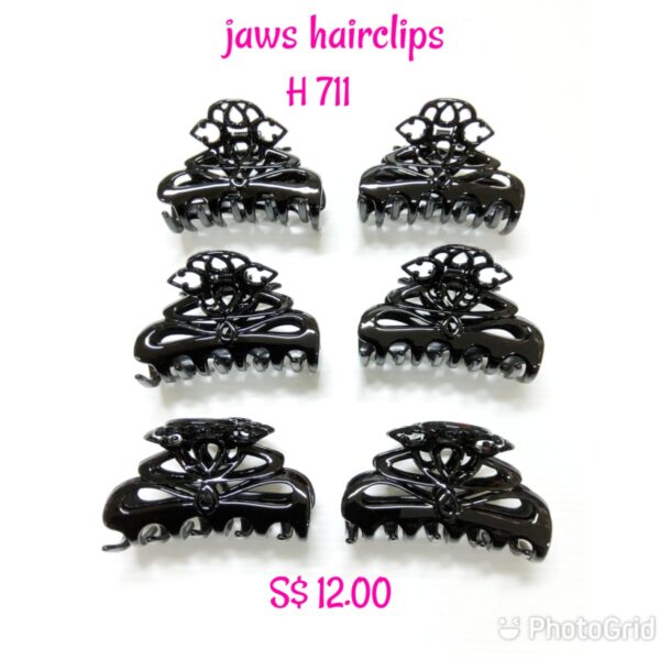 Shining black medium jaws hairclips H 711.