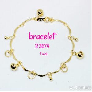 Gold plated bracelet with dangling ornaments and bells.