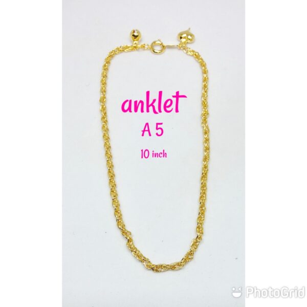 Gold plated rope design anklet with dangling bell and heart.