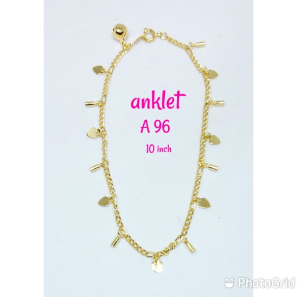 Gold plated anklet with dangling small hearts and small ornaments.