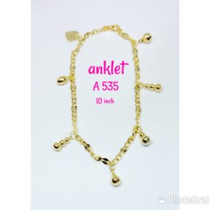 Gold plated anklet with dangling ornaments and bells.