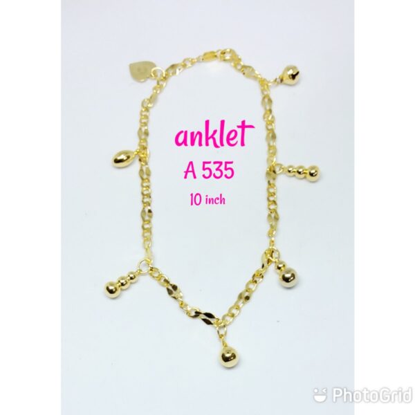 Gold plated anklet with dangling ornaments and bells.