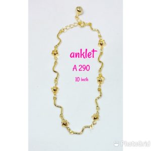 Gold plated anklet with flowers and pattern with dangling bell.