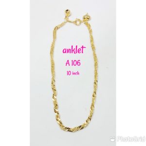 Gold plated wave design anklet with dangling bell and heart.