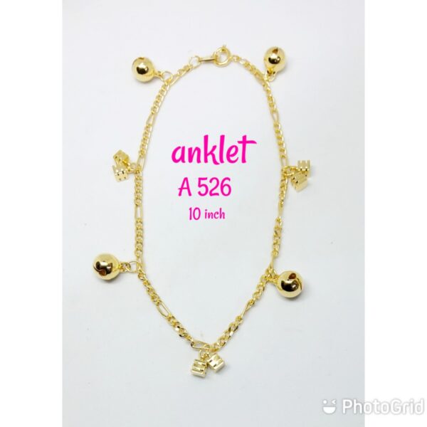 Gold plated anklet with dangling small cubes and loud bells.