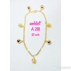 Gold plated anklet with dangling crowns and loud bells.