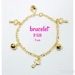 Gold plated shining bracelet with dangling keys