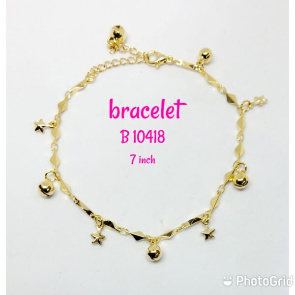 Gold plated bracelet with dangling small stars and gold balls.