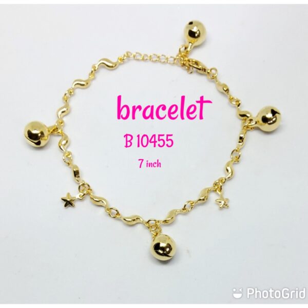 Gold plated pattern bracelet with dangling small stars and loud bells.