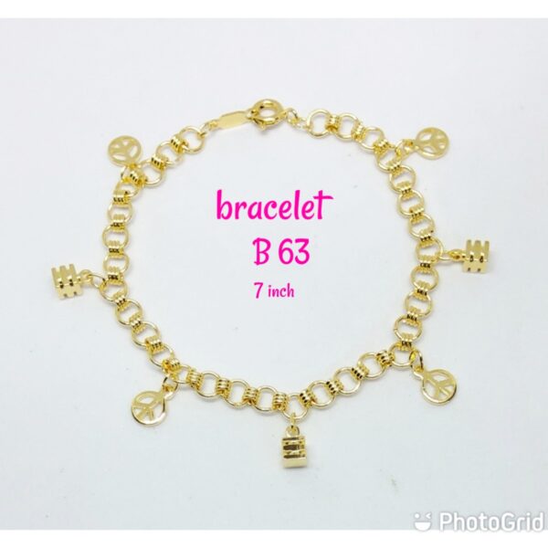 Gold plated pattern bracelet with dangling peace signs and small cubes.