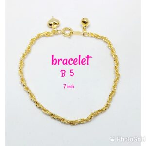 Gold plated rope design bracelet with dangling bell and heart.