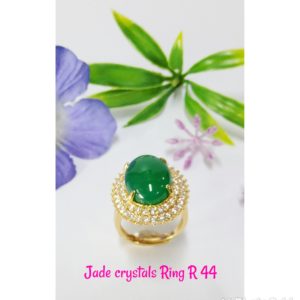 Gold plated glass jade and multi clear crystals Ring.